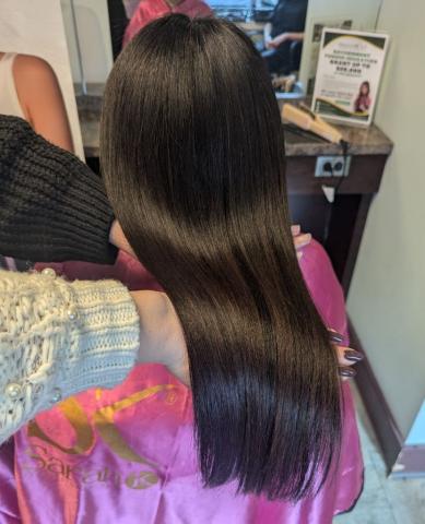 shiny, healthy, straight hair after the vegan keratin straightening treatment