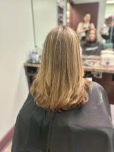 bright buttery blonde highlights on medium long hair with long layers old money natural blonde affordable hair service near me in brantford ontario hairstylist hairdresser top rated hairstyling college  2024 women's hair trends inspiration 