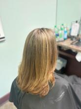 bright buttery blonde highlights on medium long hair with long layers old money natural blonde affordable hair service near me in brantford ontario hairstylist hairdresser top rated hairstyling college  2024 women's hair trends inspiration