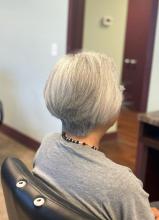 women's trendy short hair cut idea 2024 graduated layered bob layers texture affordable hair service near me in brantford ontario at hair school salon hairstyling college diploma